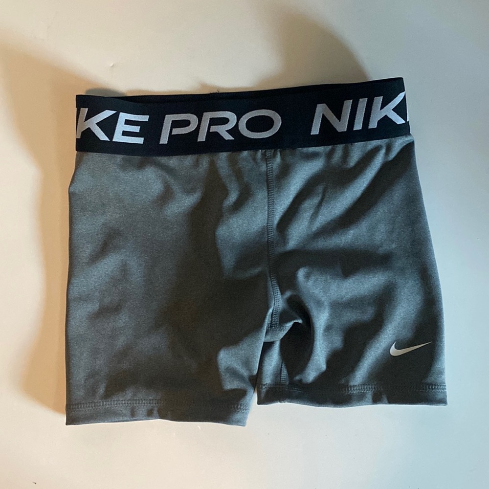 grey and black nike pros